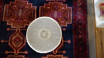 Pad was pale bone colour prior to using on rug